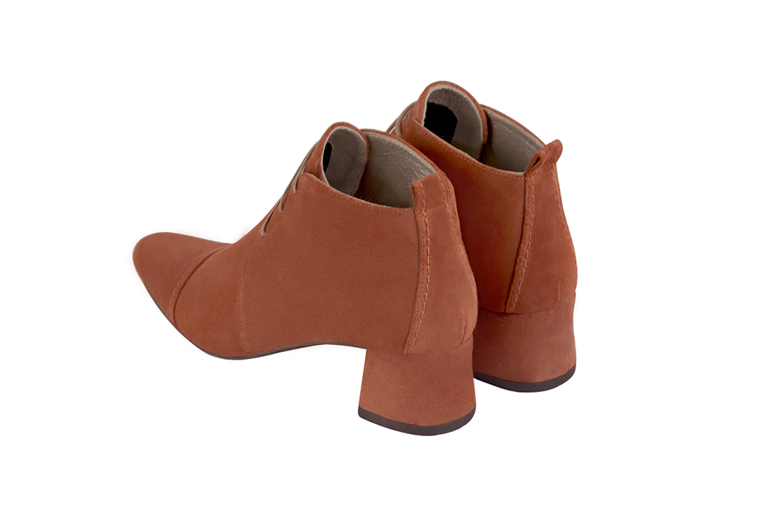 Terracotta orange women's ankle boots with laces at the front. Round toe. Low flare heels. Rear view - Florence KOOIJMAN